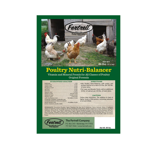 Place a white feed bag with poultry nutri balancer on it, in a small family barn with poultry in their coop in the background. This should be as if displaying the feed for sale.