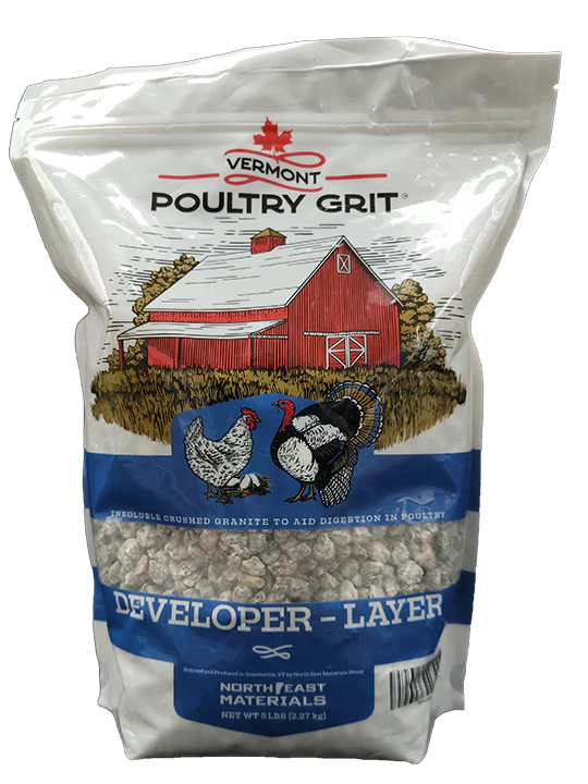 Crushed granite poultry grit in a 5lb bag, labeled "Developer-Layer," featuring chickens and a barn illustration.