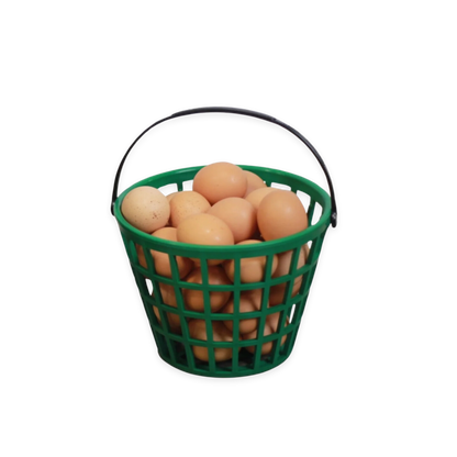 Green plastic EZ-Gather egg basket by HenGear filled with fresh eggs, ideal for backyard chicken supplies.