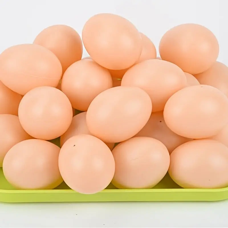 Five plastic training eggs for chickens, ideal for nesting boxes and broody hen testing by Dahlia Pets