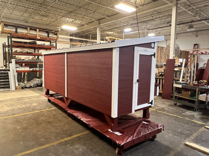 OverEZ wooden chicken coop designed for 30 chickens, featuring 10 nesting boxes and an Amish-crafted style.