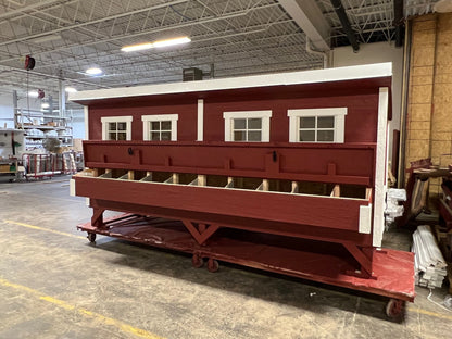 Amish-crafted wooden chicken coop for 30 chickens with 10 nesting boxes, designed for backyard poultry.