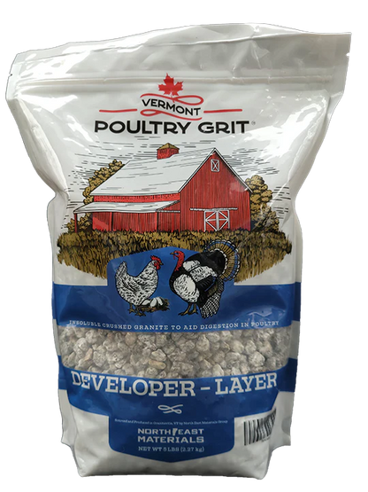 Crushed granite poultry grit in a 5lb bag, labeled "Developer-Layer," featuring chickens and a barn illustration.