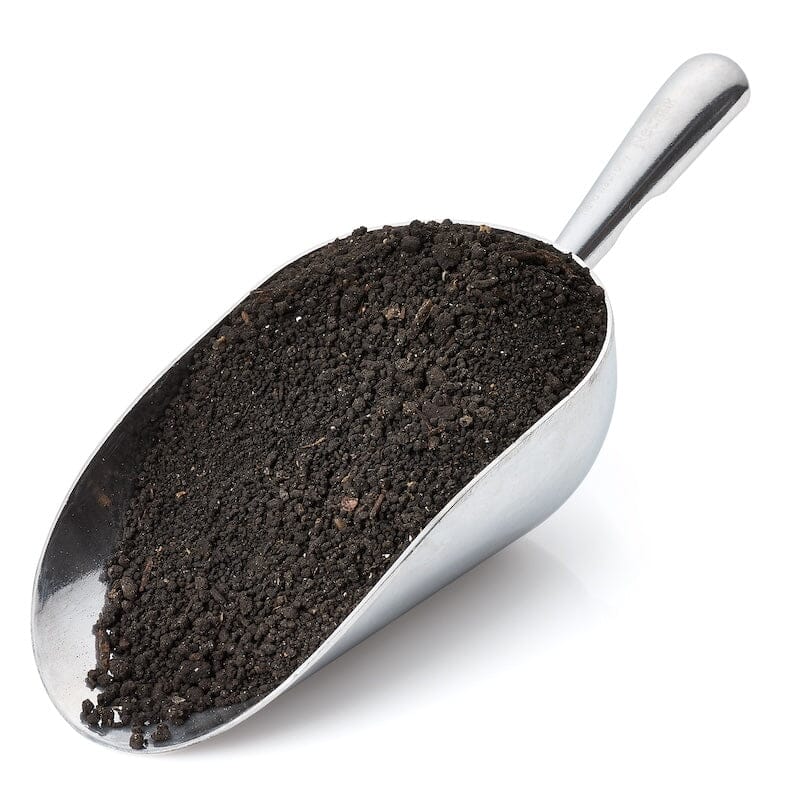 Metal scoop filled with dark, rich compost from the Urban Worm Complete Vermicomposting Starter Bundle Kit.