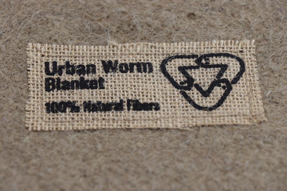 Jute fiber composting cover, 2x2ft size, from Urban Worm Company, featuring a natural brown color.