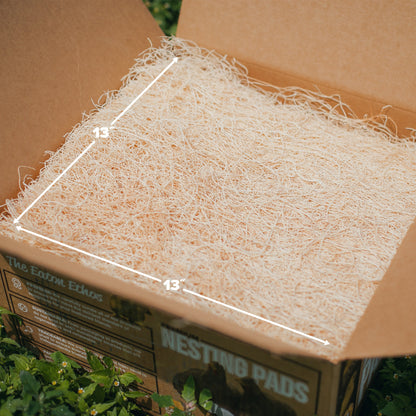 Premium aspen excelsior chicken nesting pads in a 10-pack, measuring 13” x 13”, ideal for chicken coops and nesting boxes.