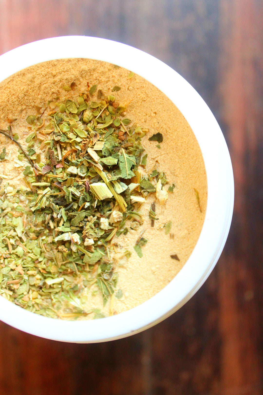 Brewer's yeast supplement for chickens and ducks, featuring a blend of herbs in a white container.