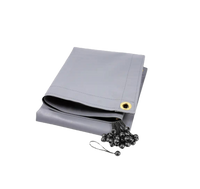 Waterproof gray tarp with UV protection for chicken coops, featuring reinforced grommets and tie-downs by The Smart Coop.