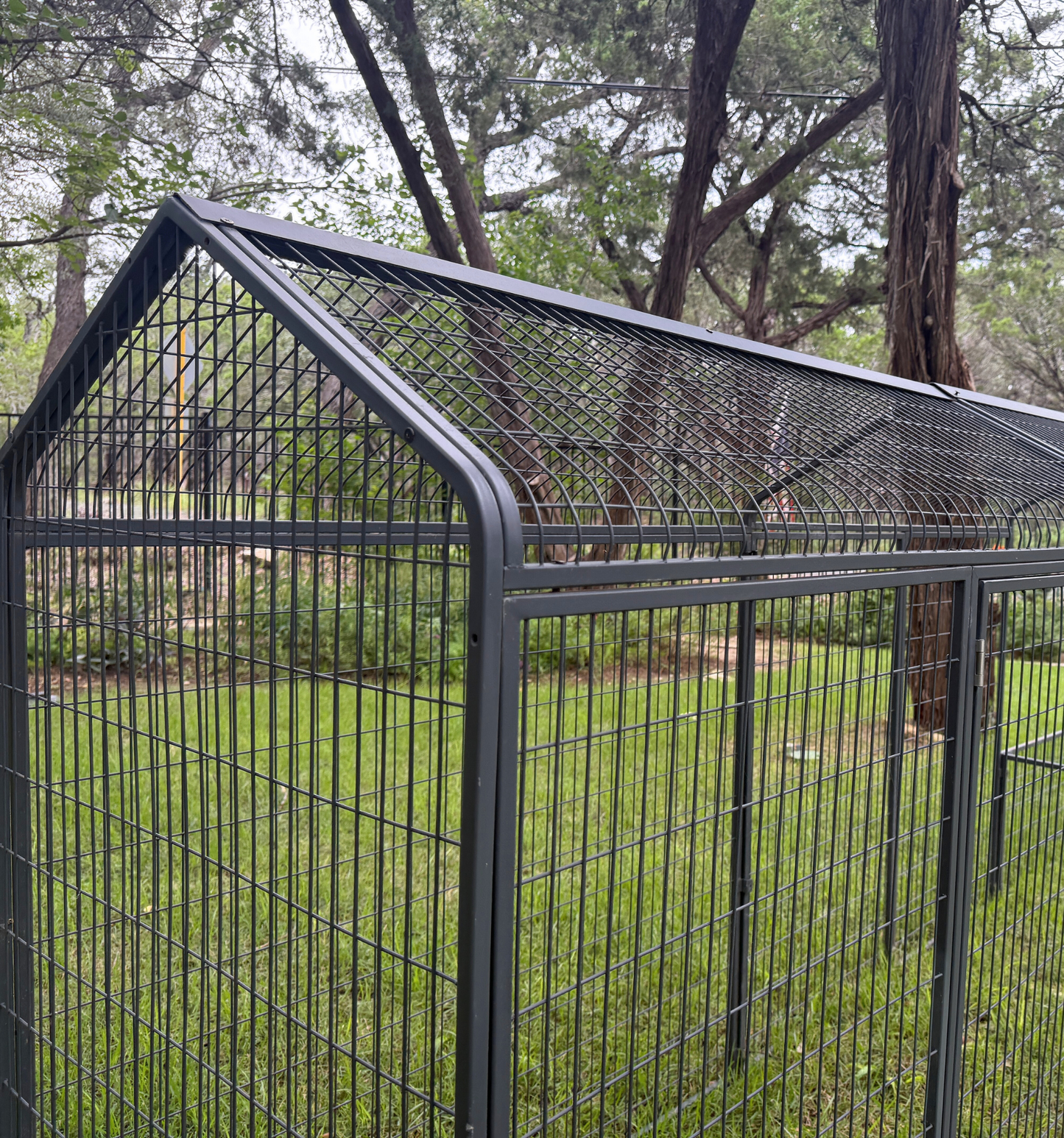 Galvanized steel mesh chicken run extension with a 16-gauge welded frame by The Smart Coop.